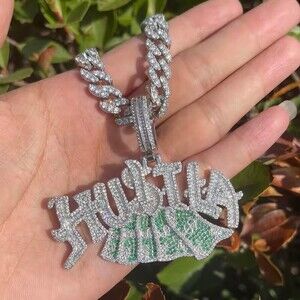 iced out “Hustla” money bag pendant with a matching 9mm Cuban link chain 20inch